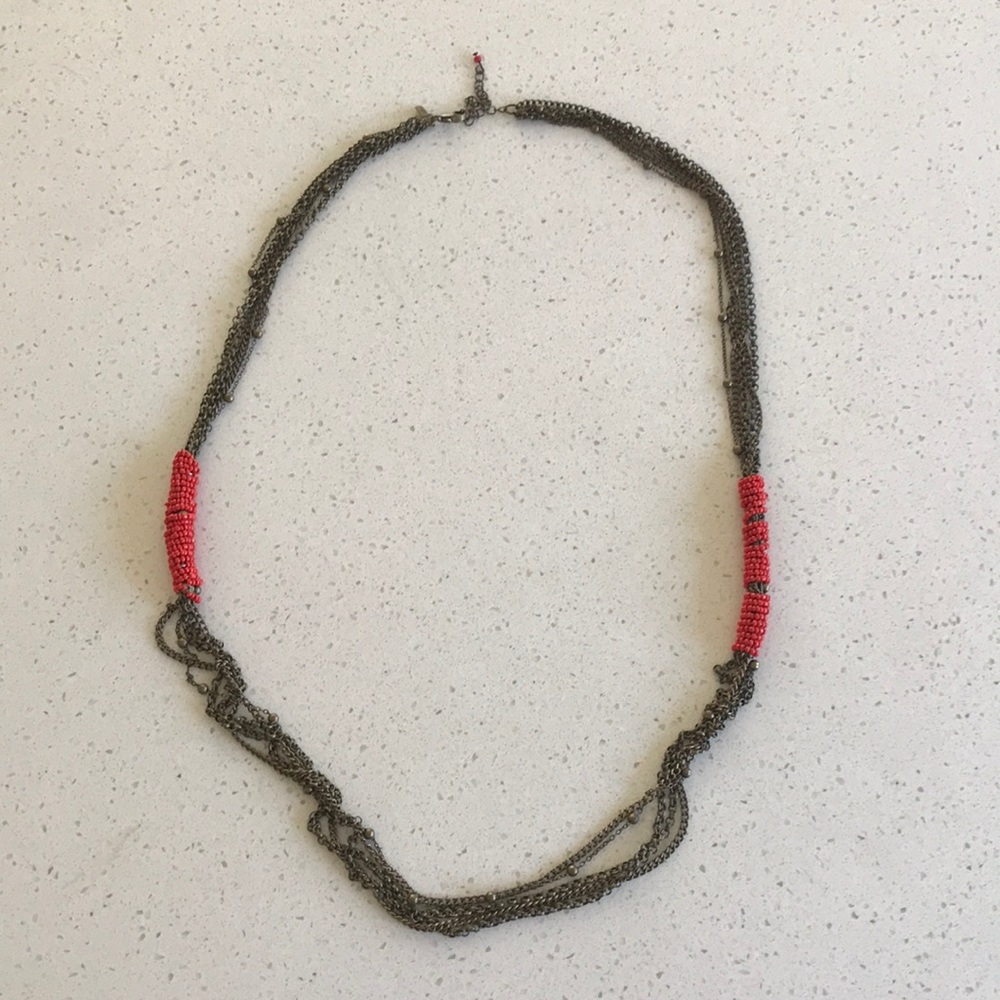 Red beaded brass colored necklace